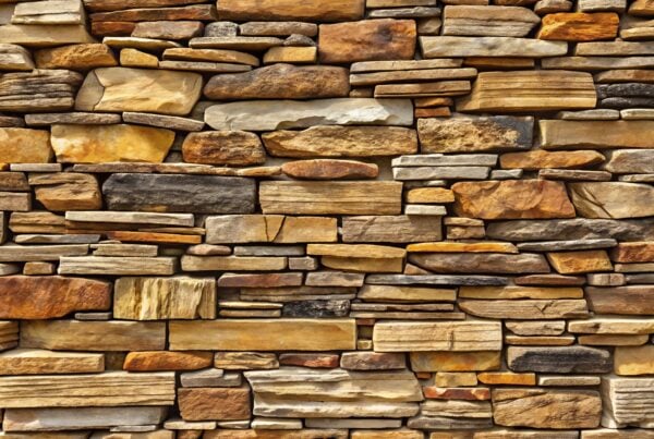 Stacked Natural Stone Wall Texture with Earthy Tones rock background